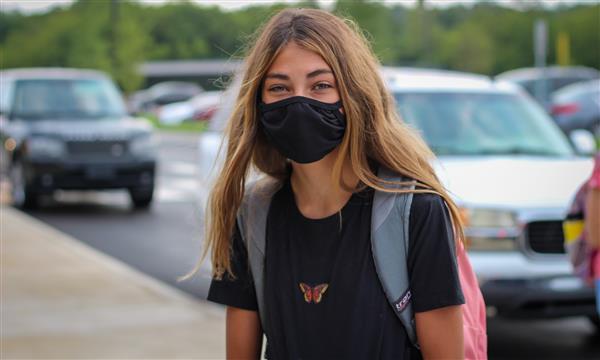 student smiles on first day of school